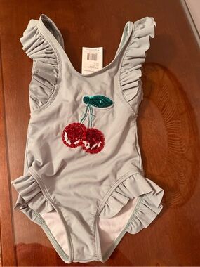 Lola + The Boys light green one-piece swimsuit with red sequin cherries